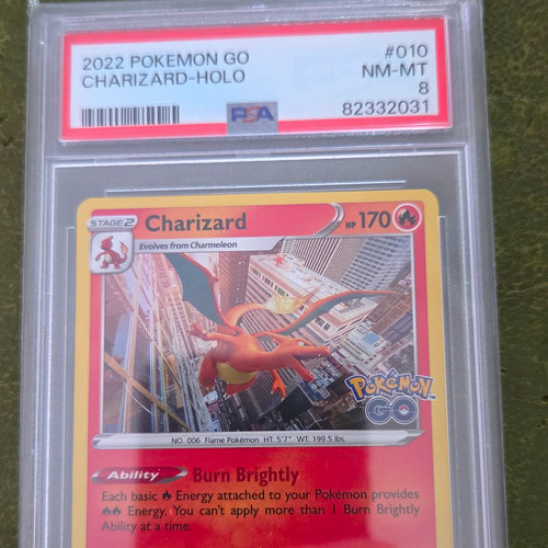 Pokemon charizard holo rara - go,